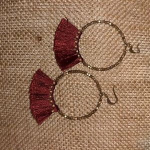 Gold hoops with maroon feathered dangles